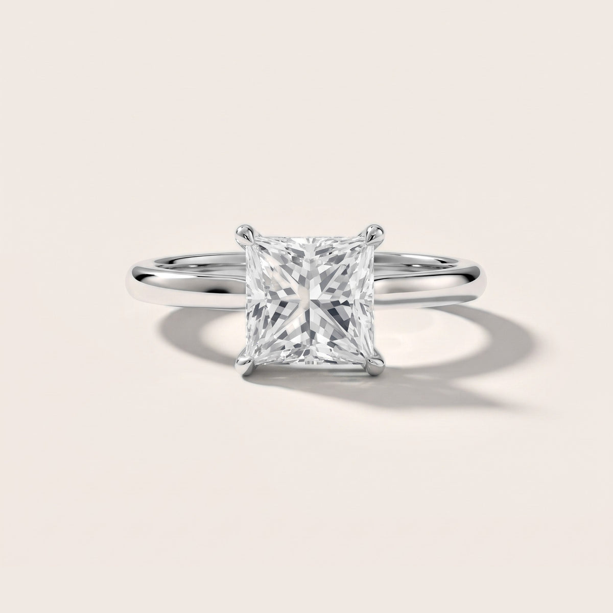 Novella East-West Solitaire Princess Diamond Engagement Ring in White Gold - front.jpg