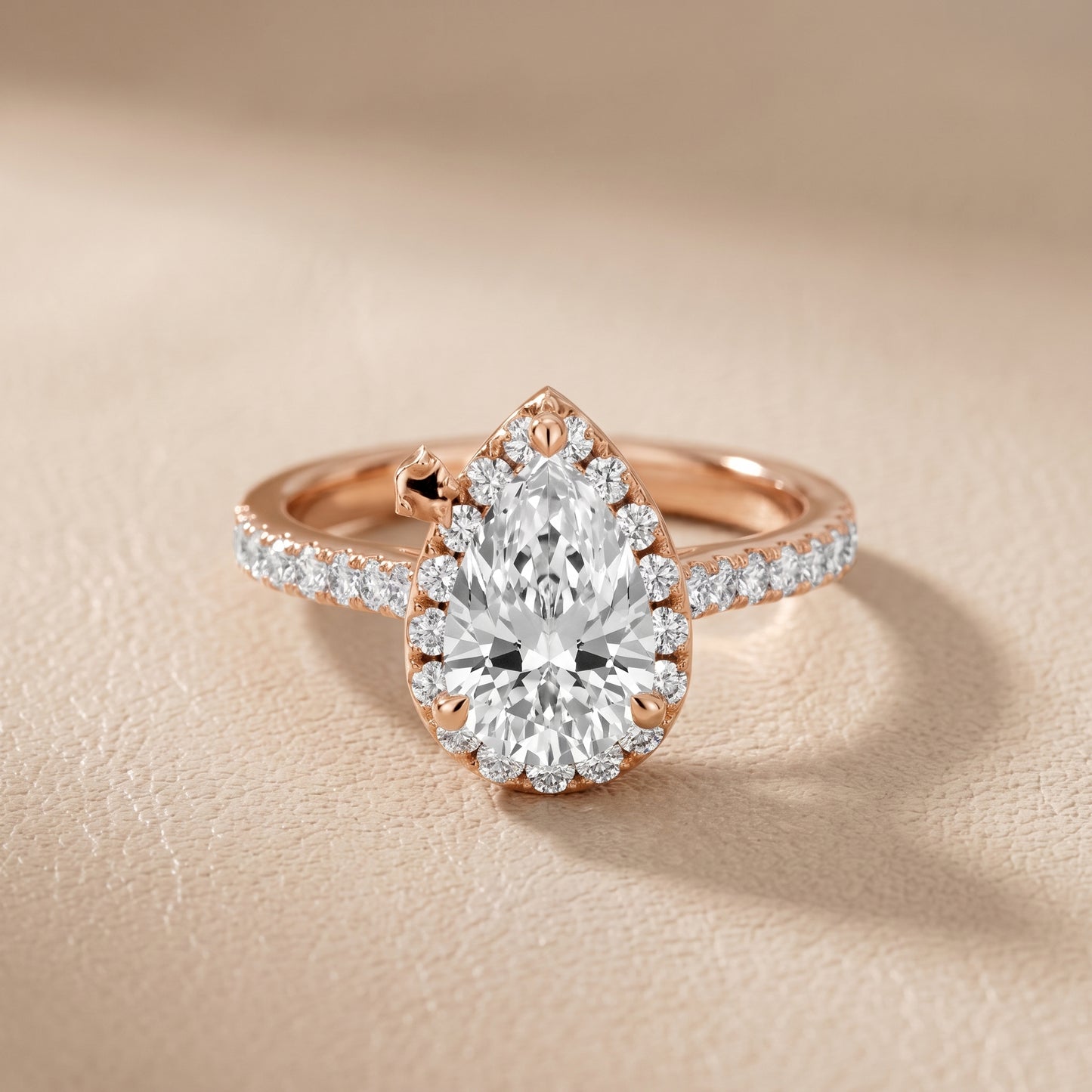 Amara Halo Claw Prong Pear Diamond Ring in Rose Gold - front.jpg