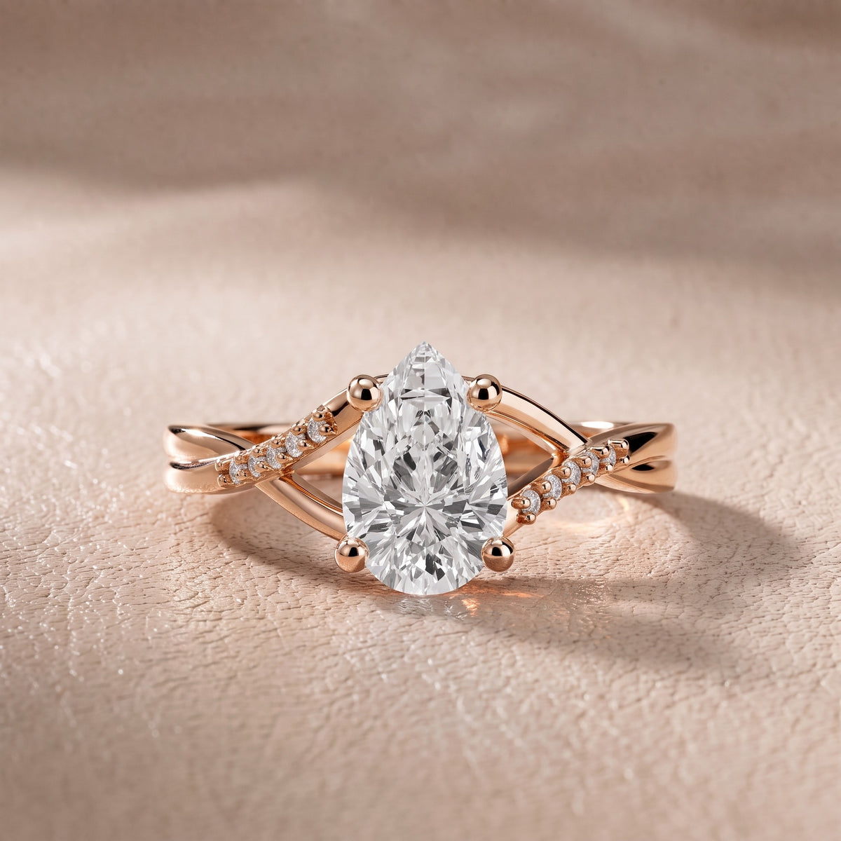 Veronica Twist Side Stone Pear Diamond Engagement Ring in Rose Gold - front.jpg