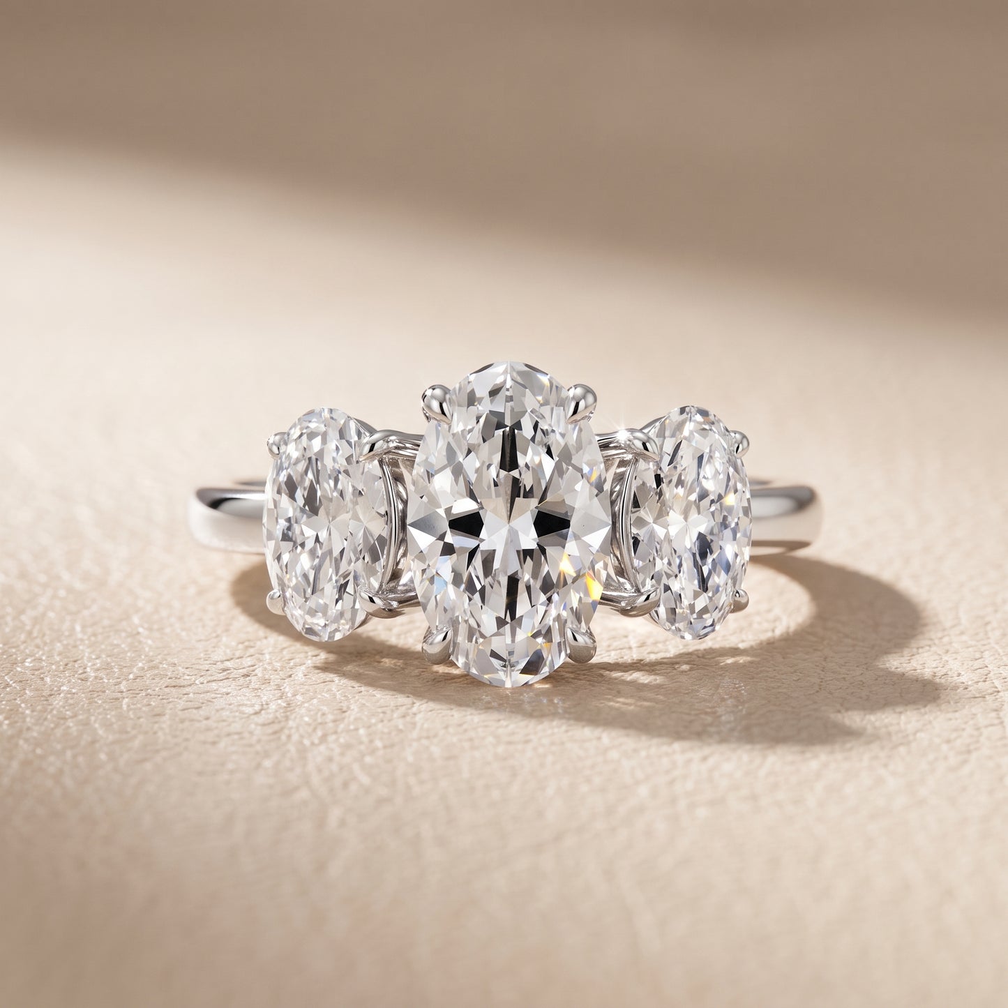 Lila Three-Stone Oval Diamond Ring in White Gold - front.jpg