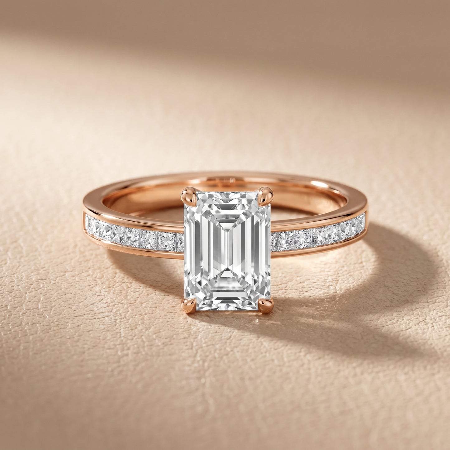 Maren Sidestone Channel Set Emerald Diamond Engagement Ring in Rose Gold - front.jpg