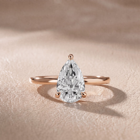 Nella Petite Solitaire Pear Diamond Engagement Ring in Rose Gold - front.jpg