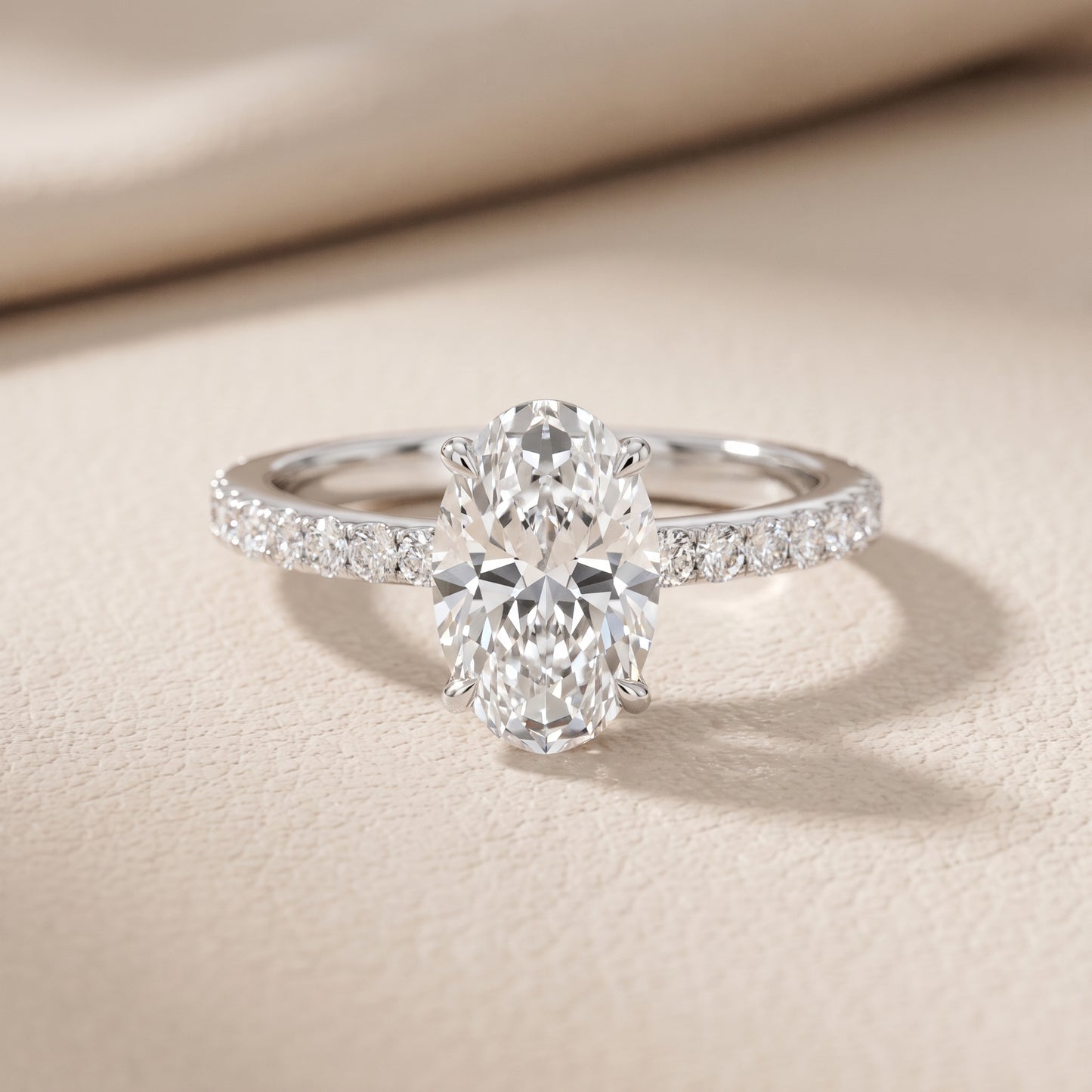 Novara Solitaire Pavé Oval Diamond Ring in Platinum - front.jpg
