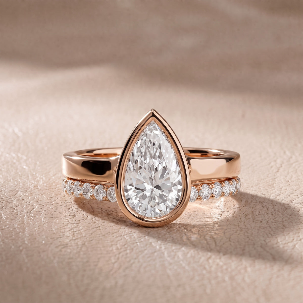 Ayla Bezel Bypass Pear Diamond Engagement Ring in Rose Gold - front.jpg
