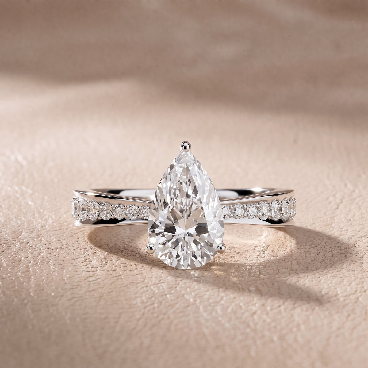 Rhea Sidestone Pavé Pear Diamond Engagement Ring in Platinum - front.jpg