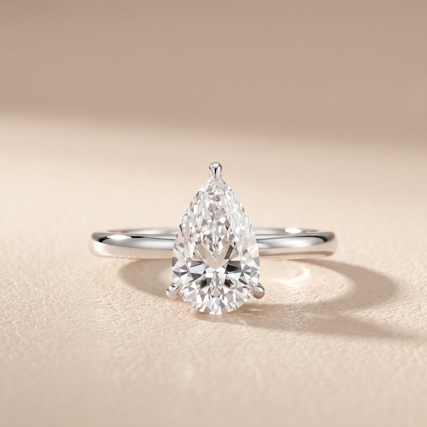 Lyla Petite Solitaire Pear Diamond Engagement Ring in White Gold - front.jpg