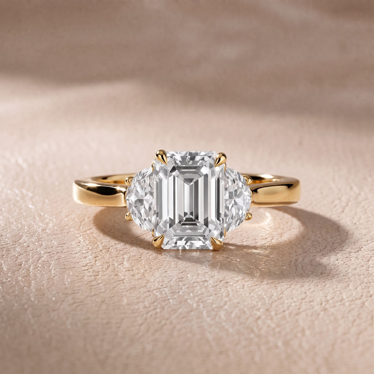 Romy Three-Stone Emerald Diamond Engagement Ring in Yellow Gold - front.jpg