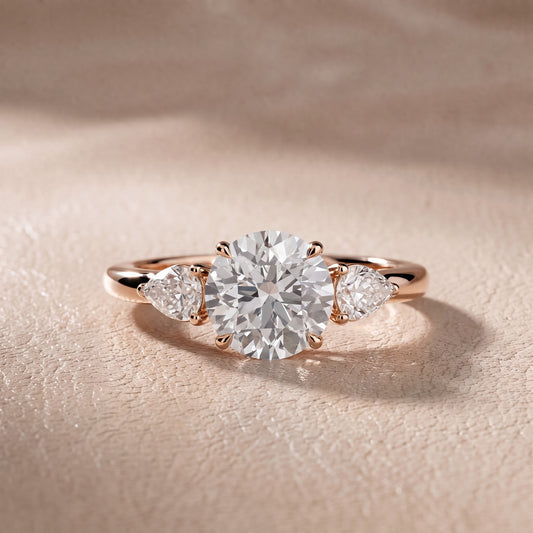 Stella Three-Stone Round Diamond Engagement Ring in Rose Gold - front.jpg