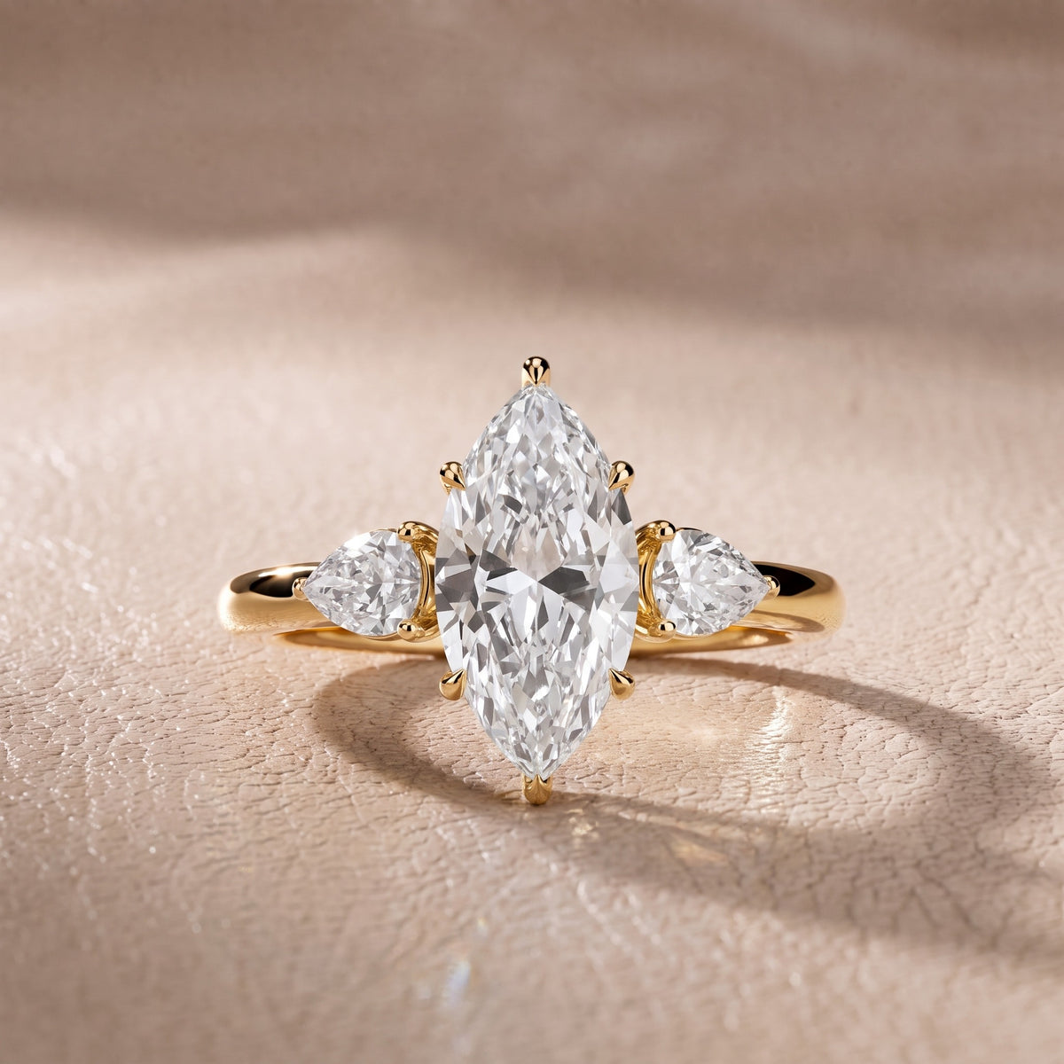 Stella Three-Stone Marquise Diamond Engagement Ring in Yellow Gold - front.jpg