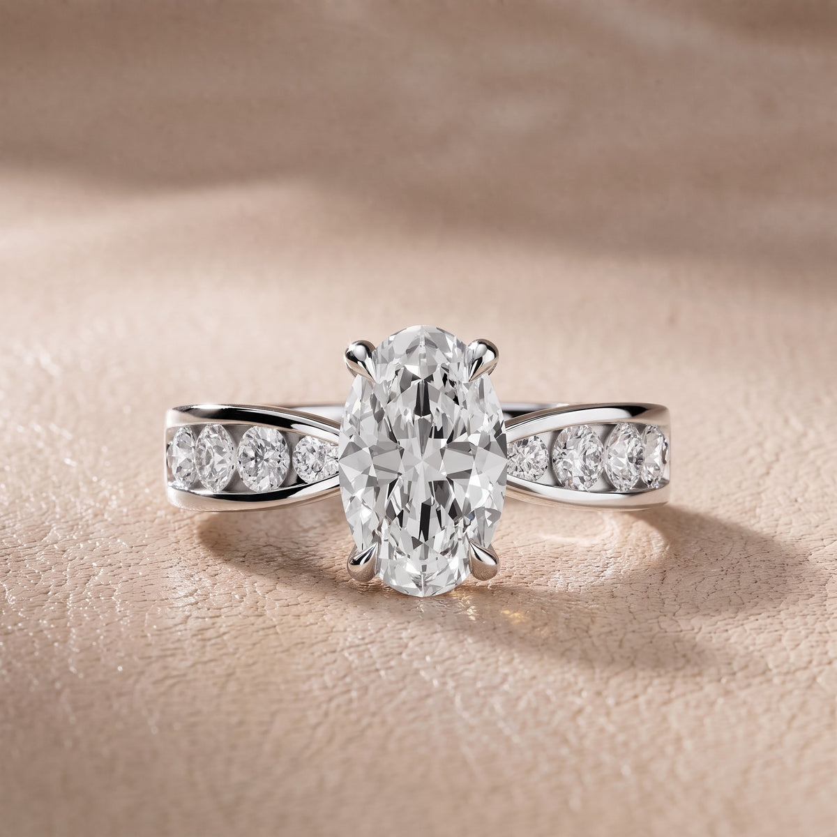 Rosalie Channel Set Sidestone Oval Diamond Engagement Ring in Platinum - front.jpg