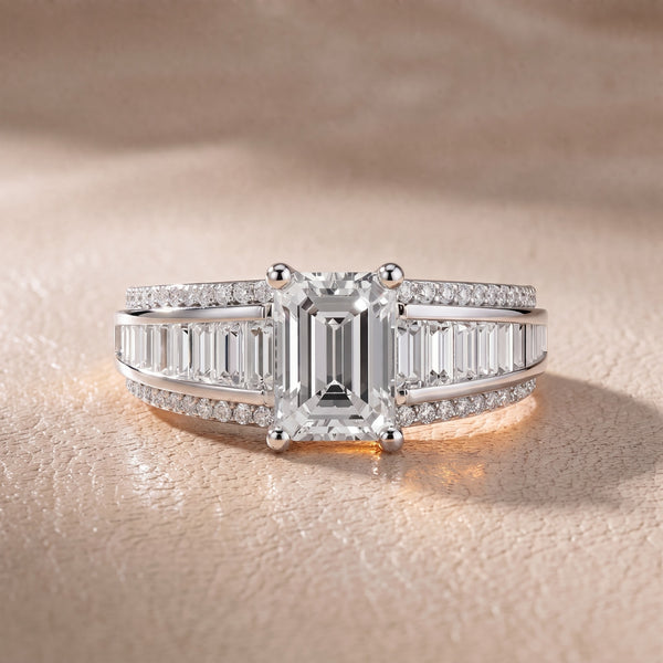 Tara Channel Set Baguette Accent Emerald Diamond Engagement Ring in White Gold