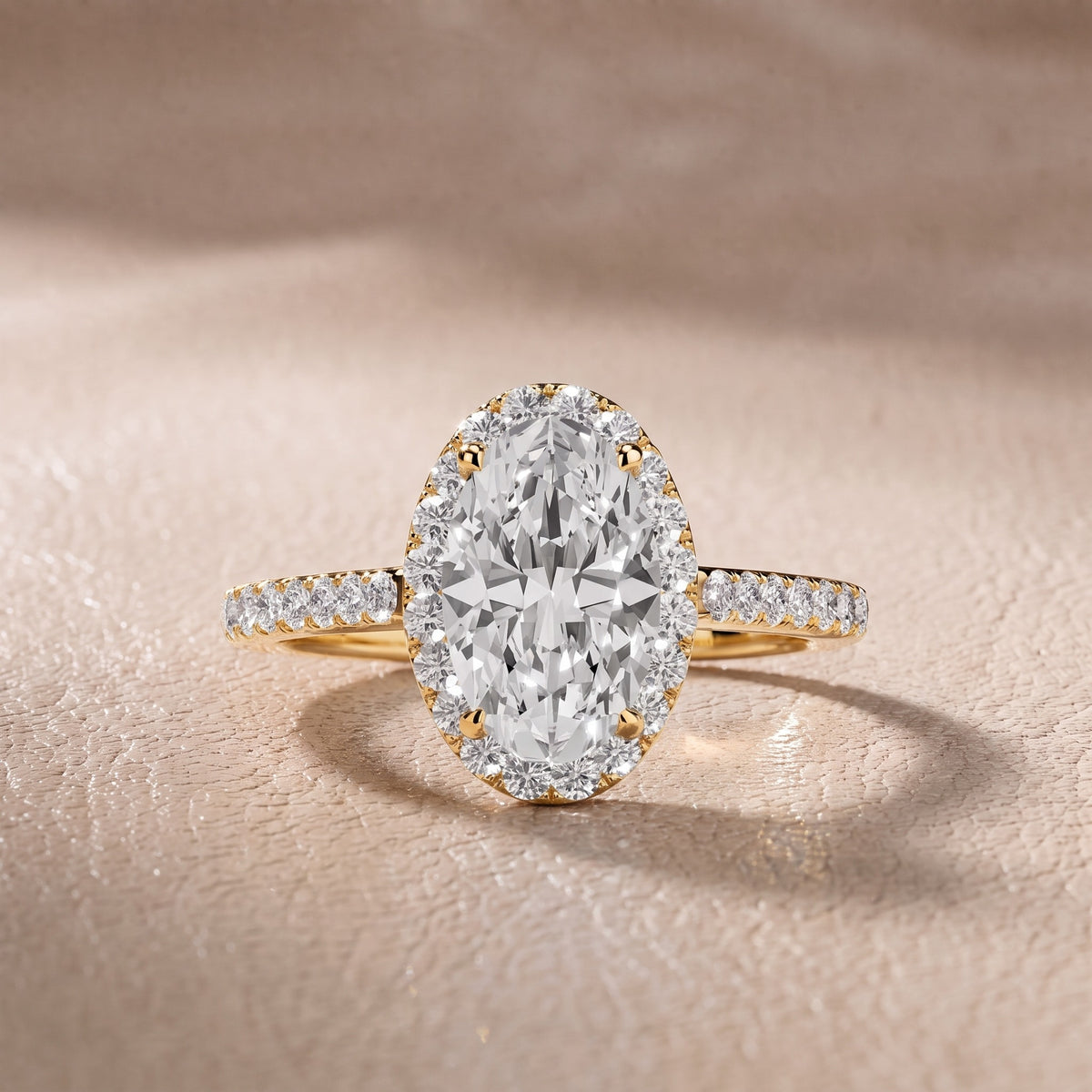 Alma Halo Pavé Oval Diamond Engagement Ring in Yellow Gold - front.jpg