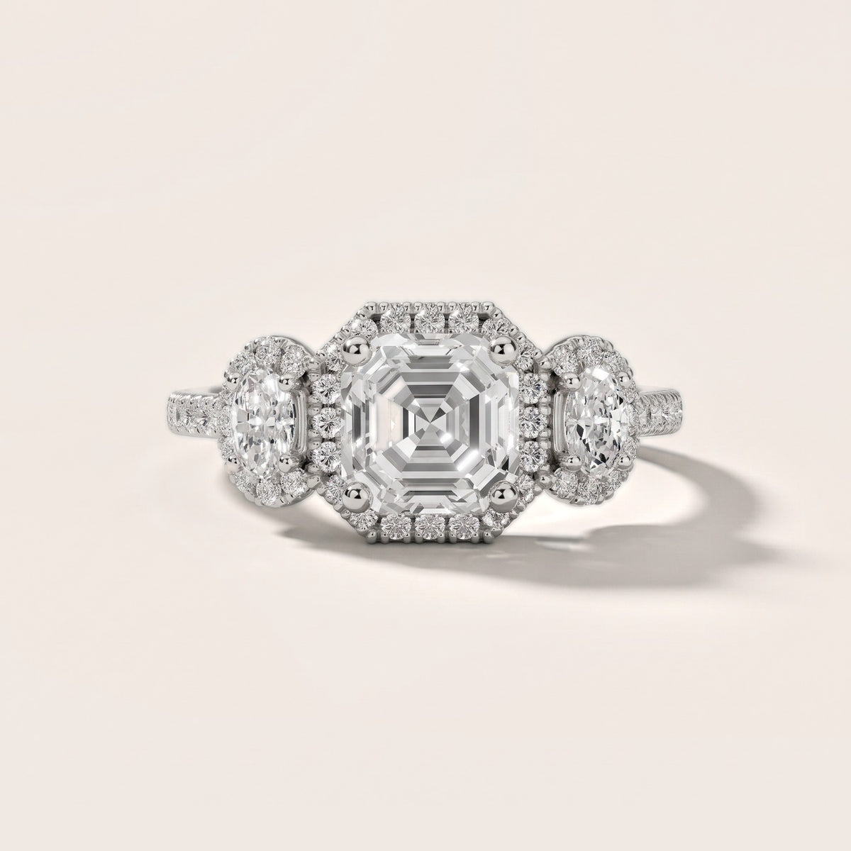 Austin Three-Stone Halo Asscher Diamond Engagement Ring in Platinum - front.jpg