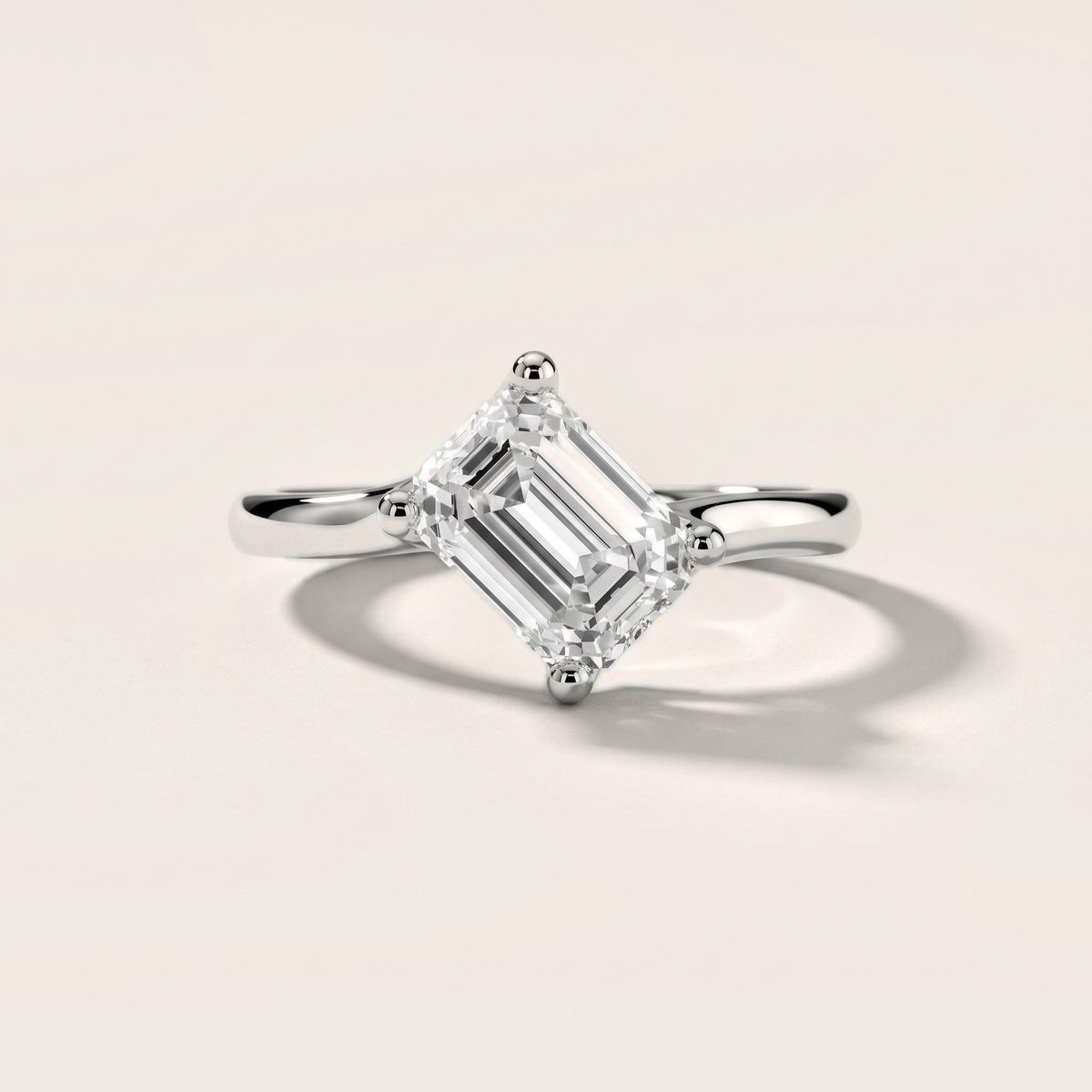 Clio Bypass Solitaire Emerald Diamond Engagement Ring in Silver - front.jpg