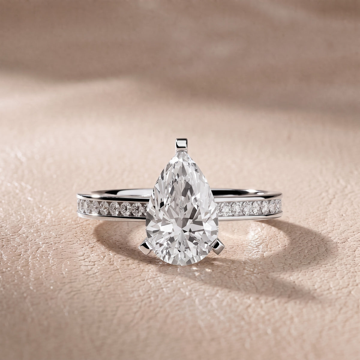 Tessa Solitaire Channel Set Pear Diamond Engagement Ring in White Gold - front.jpg