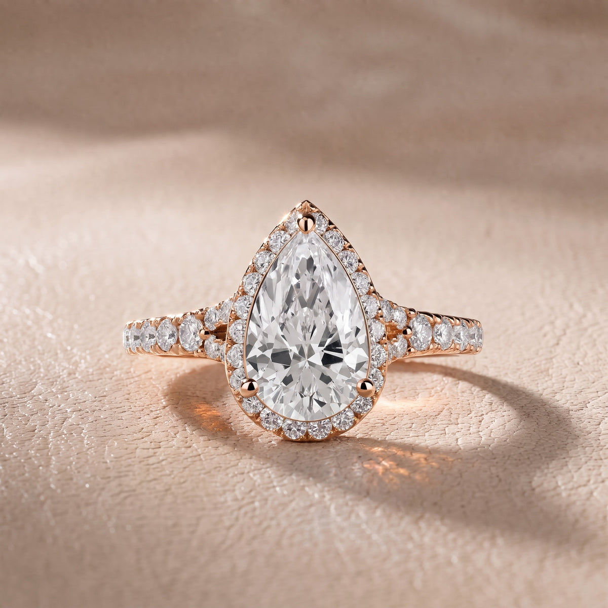 Bella Halo Pavé Pear Diamond Engagement Ring in Rose Gold - front.jpg