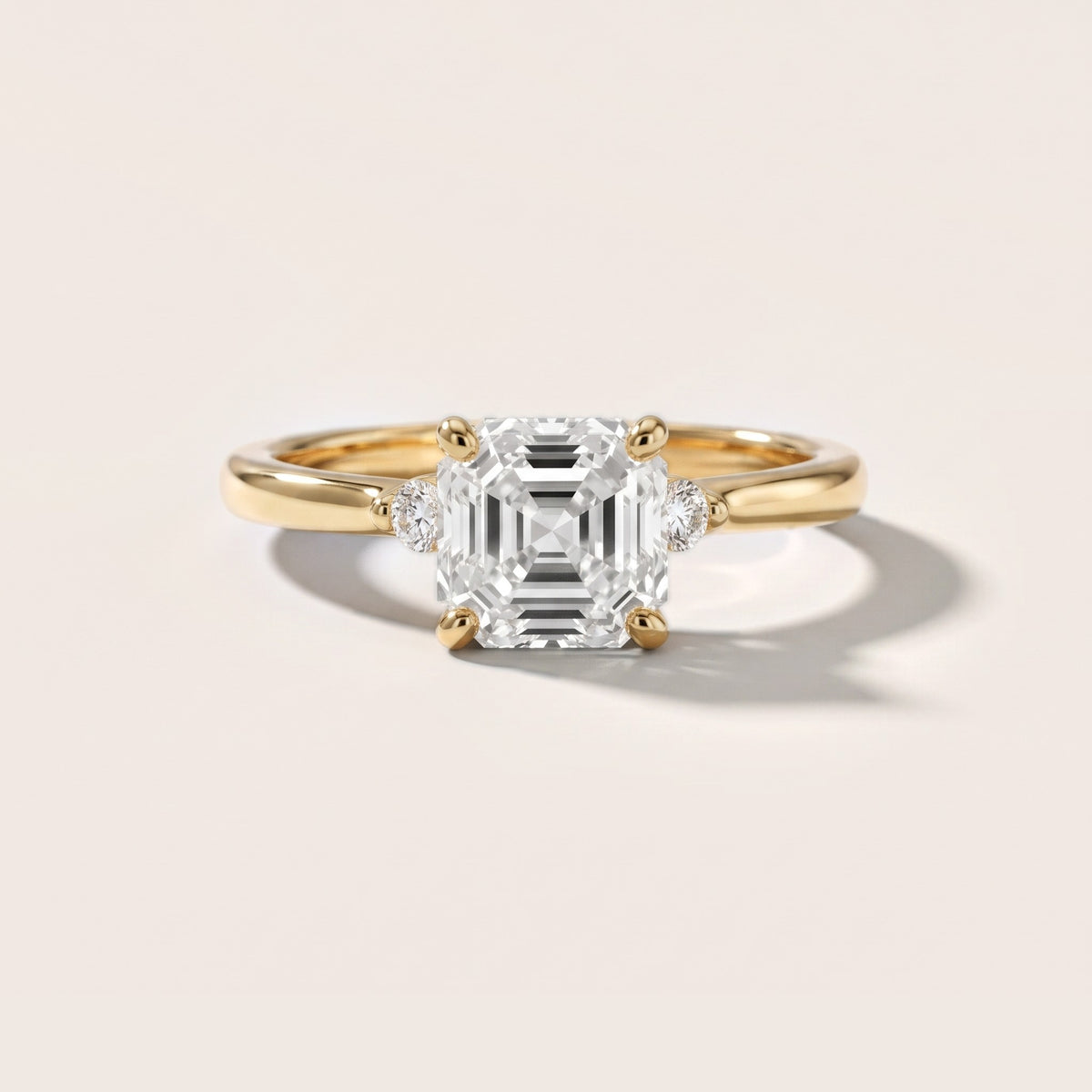 Teodora Floating Three-Stone Asscher Diamond Engagement Ring in Yellow Gold - front.jpg