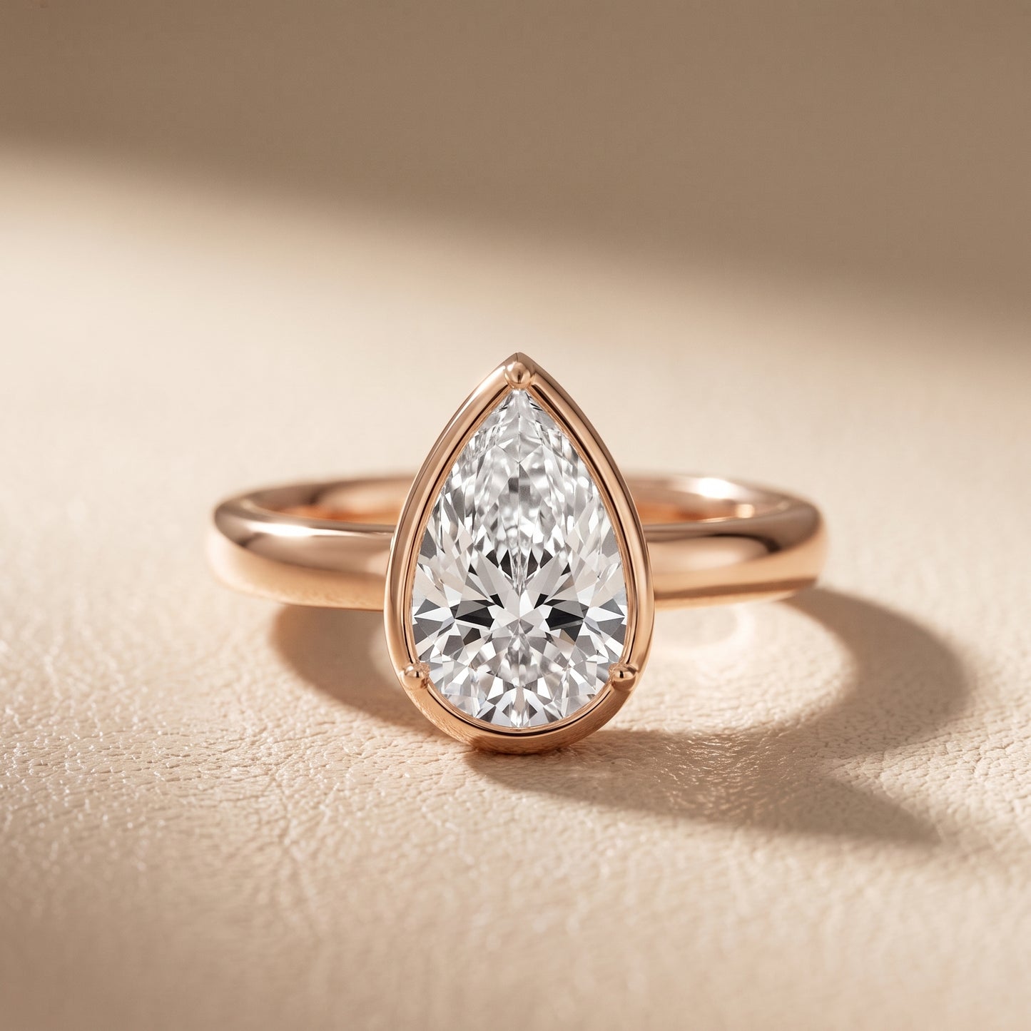 Alina Bezel Solitaire Pear Diamond Ring in Rose Gold - front.jpg