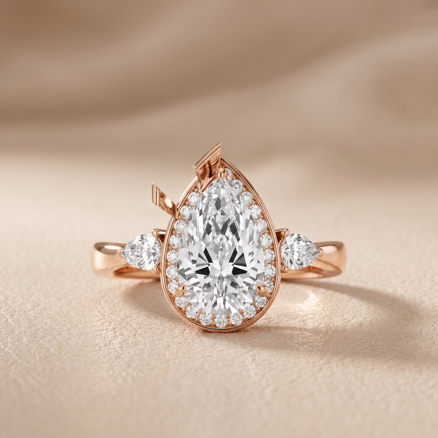 Eliza Halo Sidestone Pear Diamond Engagement Ring in Rose Gold - front.jpg