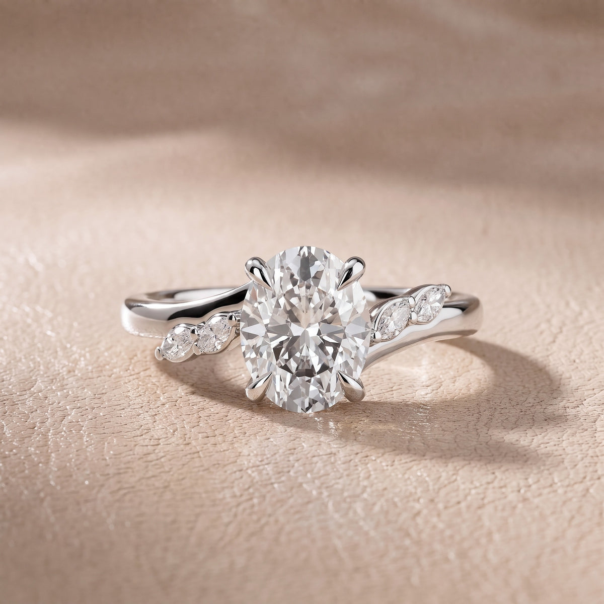 Flora Twist Side Stone Oval Diamond Engagement Ring in Platinum - front.jpg