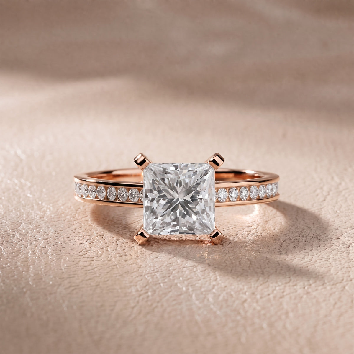Tessa Solitaire Channel Set Princess Diamond Engagement Ring in Rose Gold - front.jpg