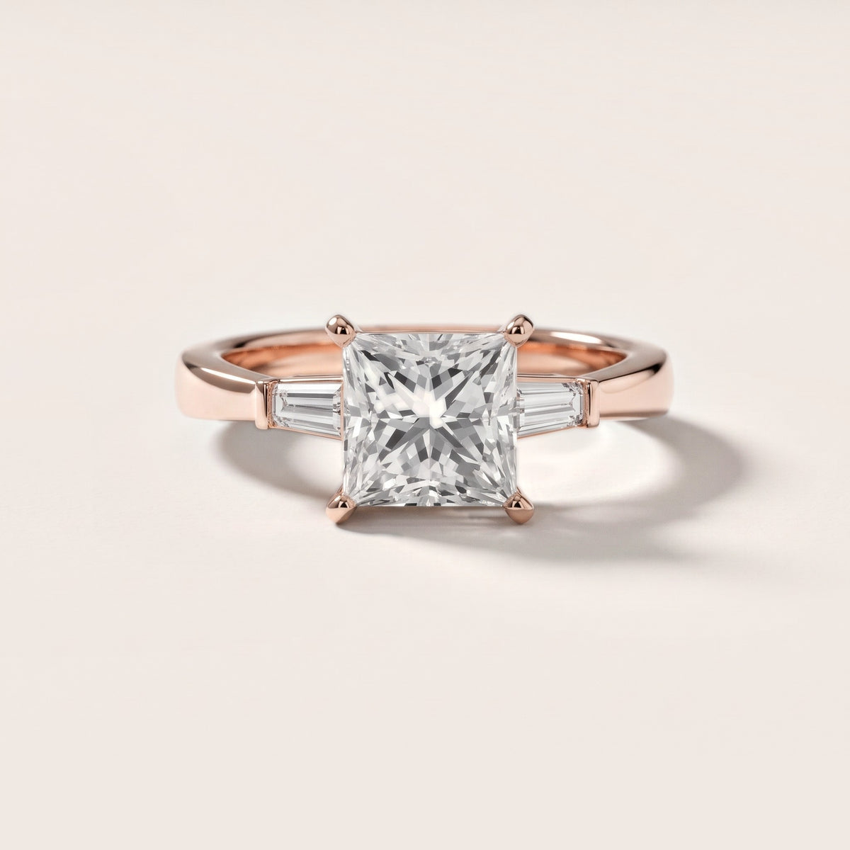 Jacinta Baguette Three-Stone Princess Diamond Engagement Ring in Rose Gold - front.jpg