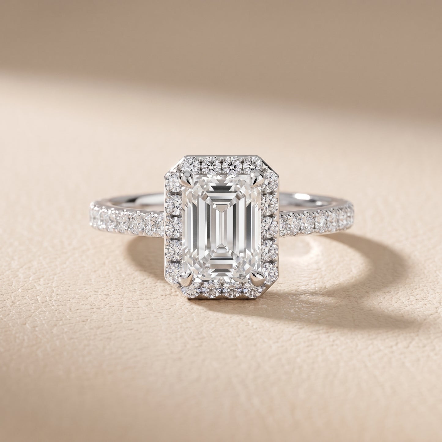 Amara Halo Claw Prong Emerald Diamond Ring in White Gold - front.jpg