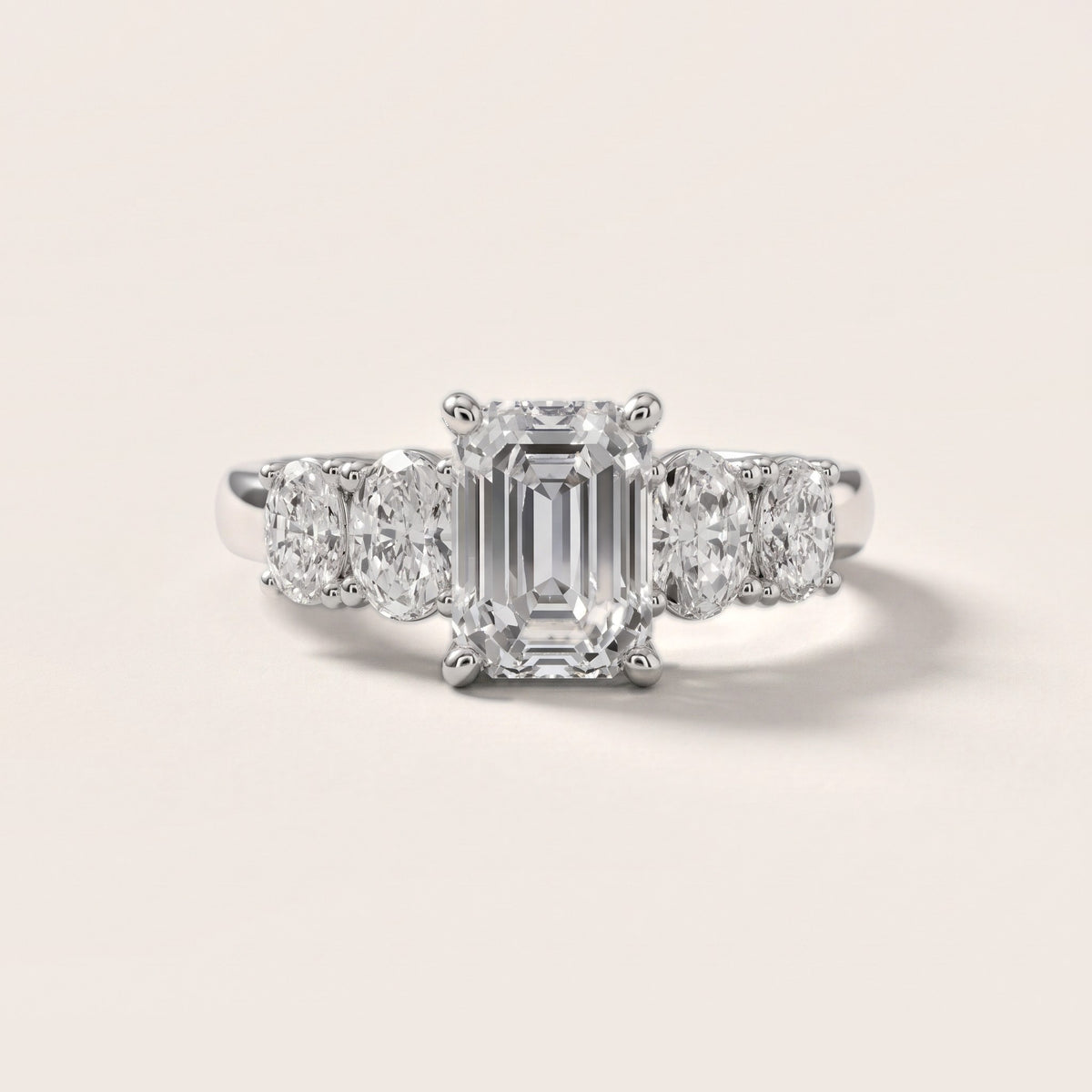 Judith Statement Five-Stone Emerald Diamond Engagement Ring in Platinum - front.jpg