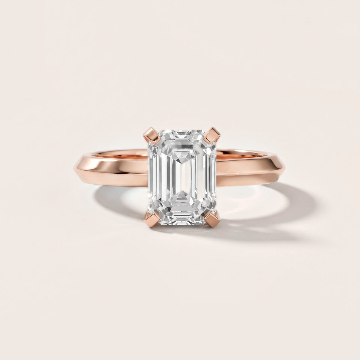 June Solitaire Knife Edge Emerald Diamond Engagement Ring in Rose Gold - front.jpg