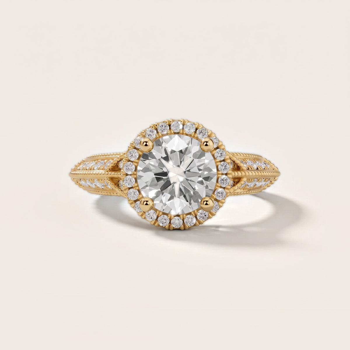 Logan Milgrain Halo Round Diamond Engagement Ring in Yellow Gold - front.jpg