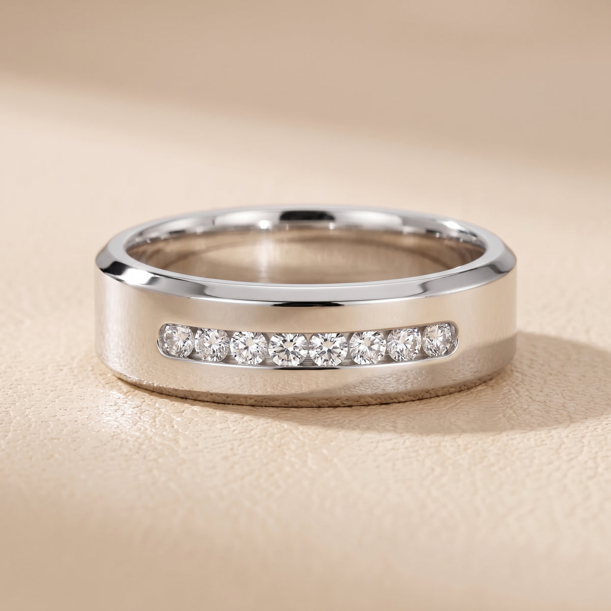 Reva Channel Set Round Diamond Wedding Band in Platinum - front.jpg