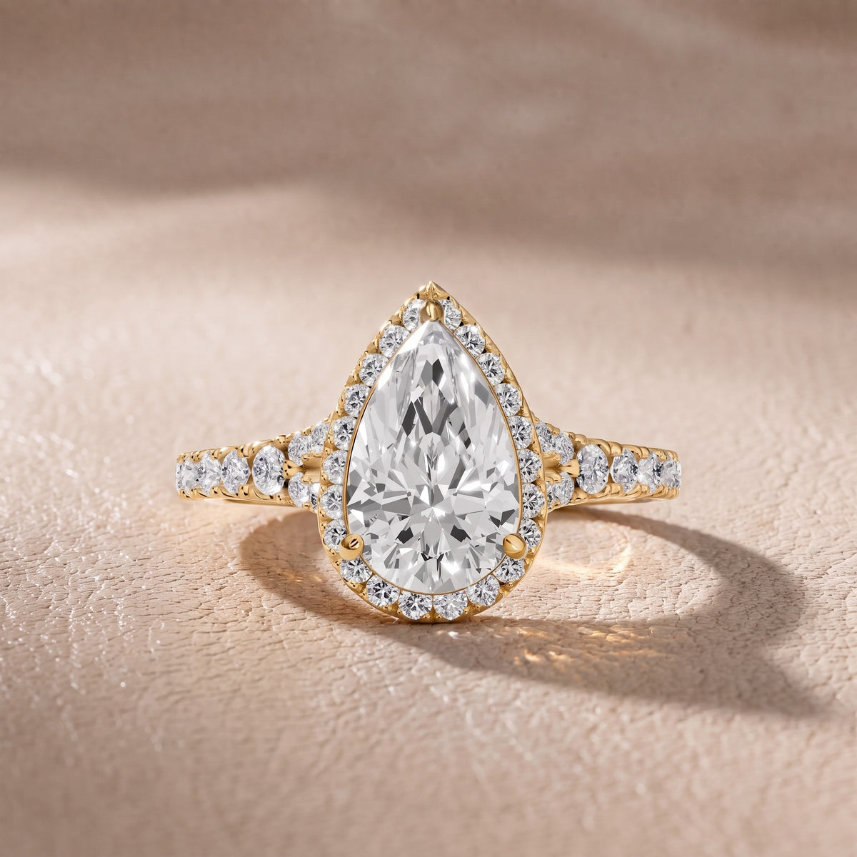 Bella Halo Pavé Pear Diamond Engagement Ring in Yellow Gold - front.jpg
