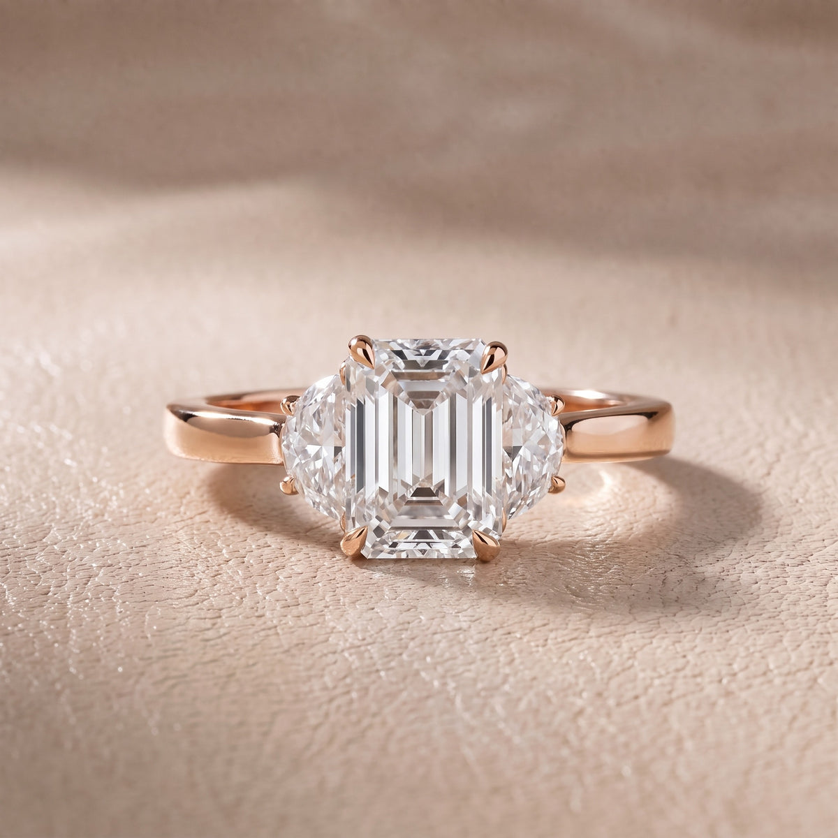 Romy Three-Stone Emerald Diamond Engagement Ring in Rose Gold - front.jpg