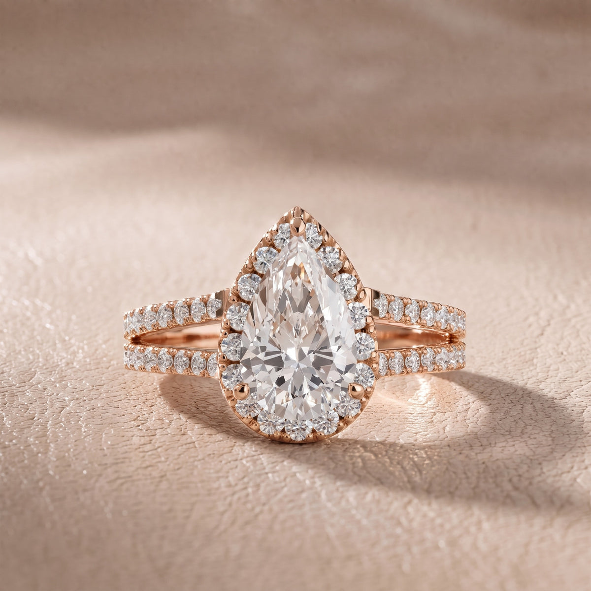 Kira Halo Split Shank Pear Diamond Engagement Ring in Rose Gold - front.jpg