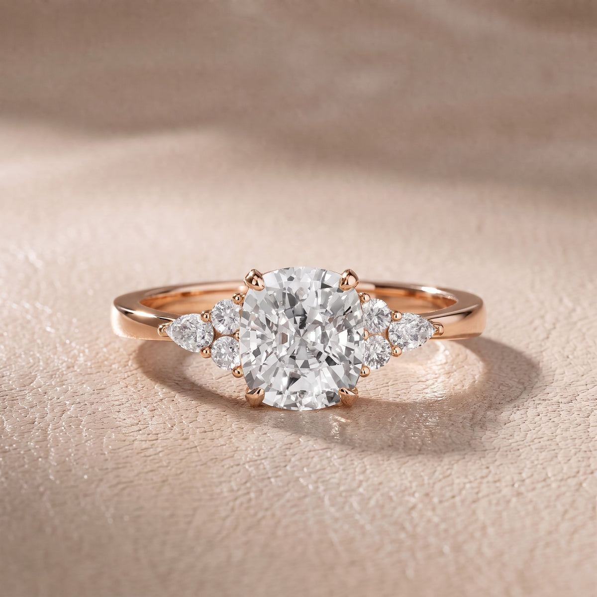 Amelia Three Stone Cushion Diamond Engagement Ring in Rose Gold - front.jpg