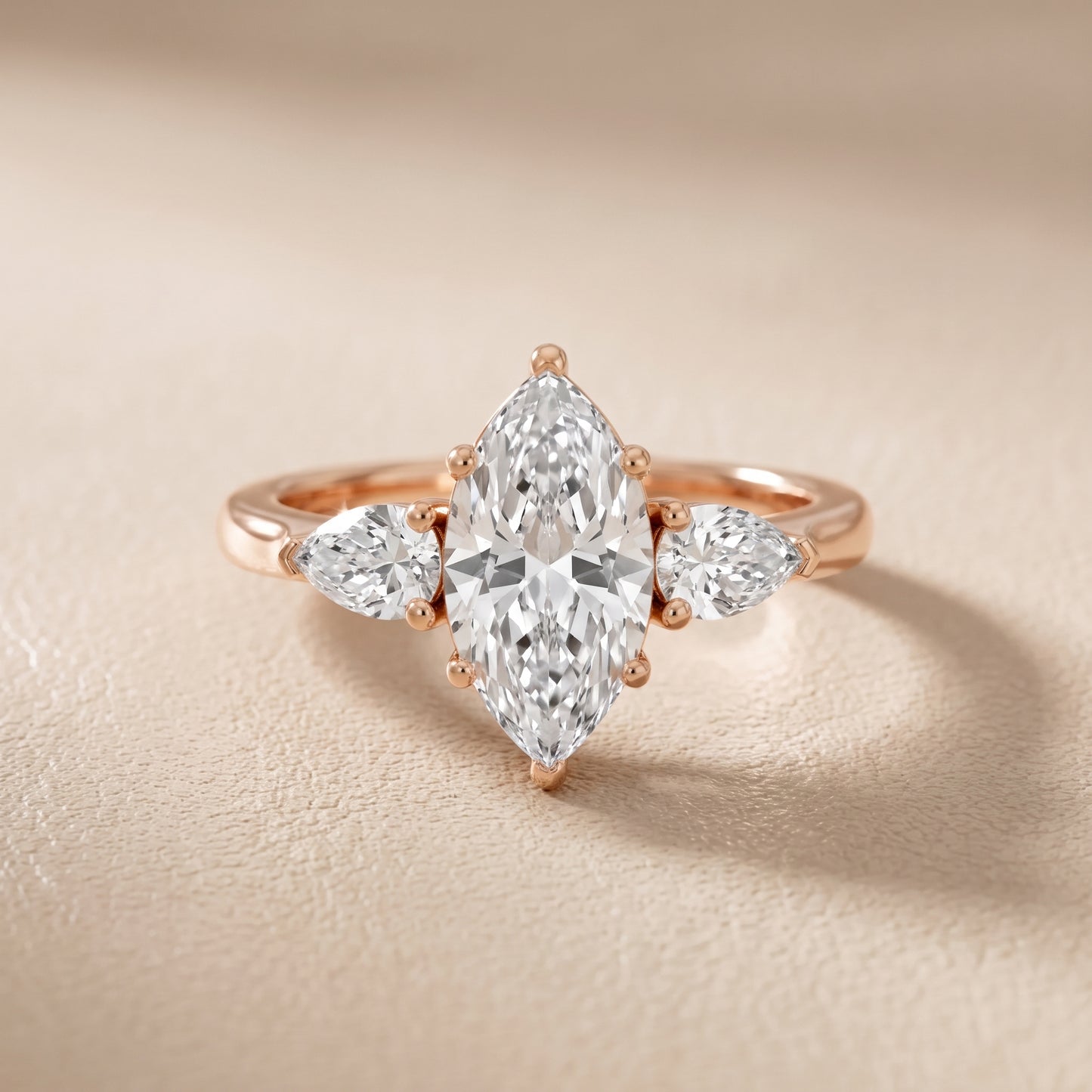 Mirabel Three-Stone Marquise Diamond Engagement Ring in Rose Gold - front.jpg