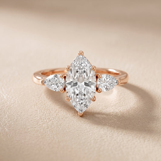 Mirabel Three-Stone Marquise Diamond Engagement Ring in Rose Gold - front.jpg