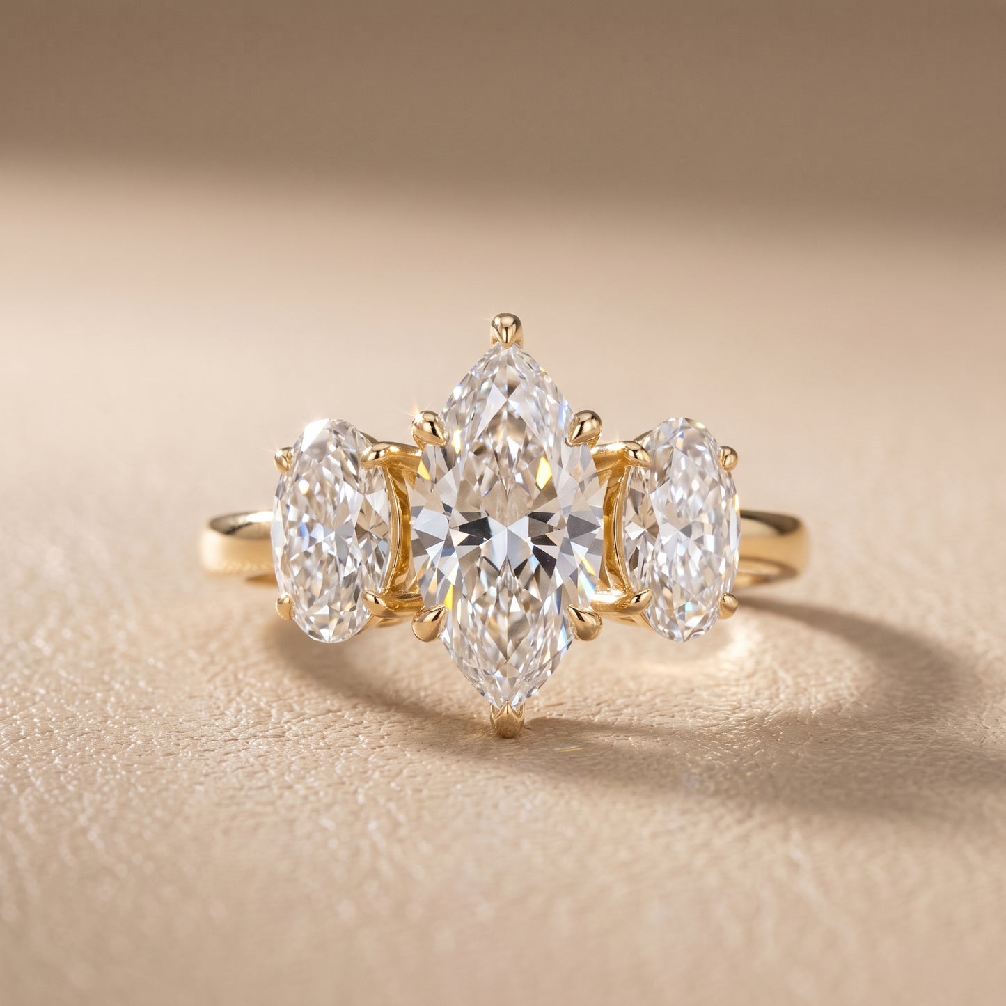 Lila Three-Stone Marquise Diamond Ring in Yellow Gold - front.jpg
