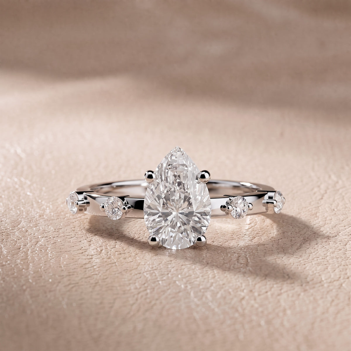 Elena Radiance Solitaire Pear Diamond Engagement Ring in Silver - front.jpg