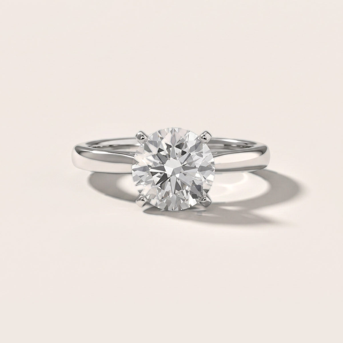 Enid Solitaire Cathedral Round Diamond Engagement Ring in Silver - front.jpg