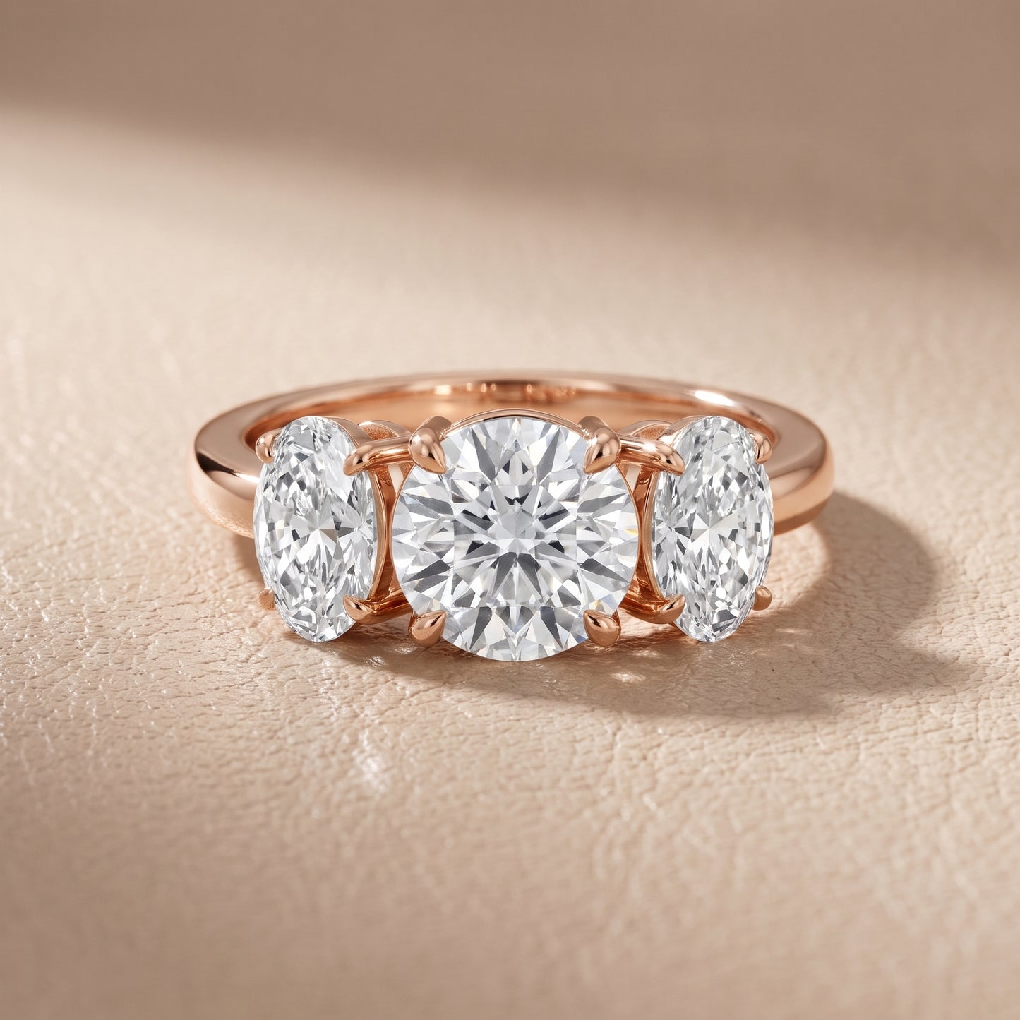 Lila Three-Stone Round Diamond Ring in Rose Gold - front.jpg