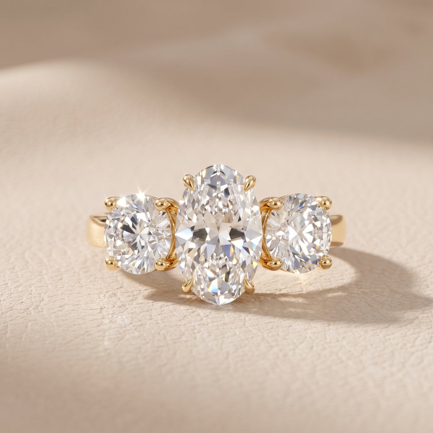 Esme Three-Stone Tapered Oval Diamond Ring in Yellow Gold - front.jpg