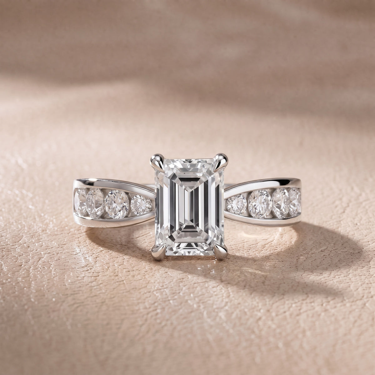 Rosalie Channel Set Sidestone Emerald Diamond Engagement Ring in White Gold - front.jpg