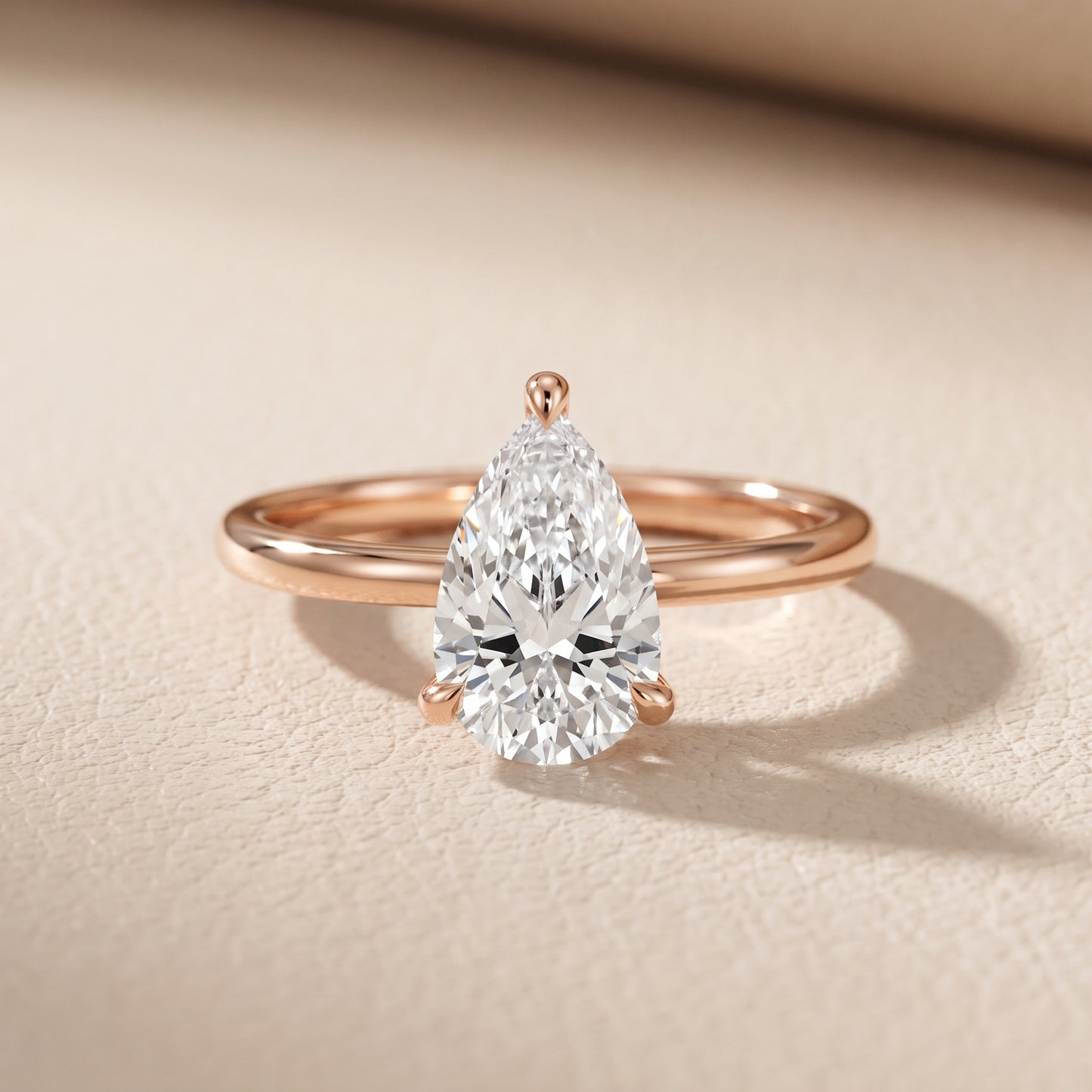Nella Petite Solitaire Pear Diamond Engagement Ring in Rose Gold - front.jpg