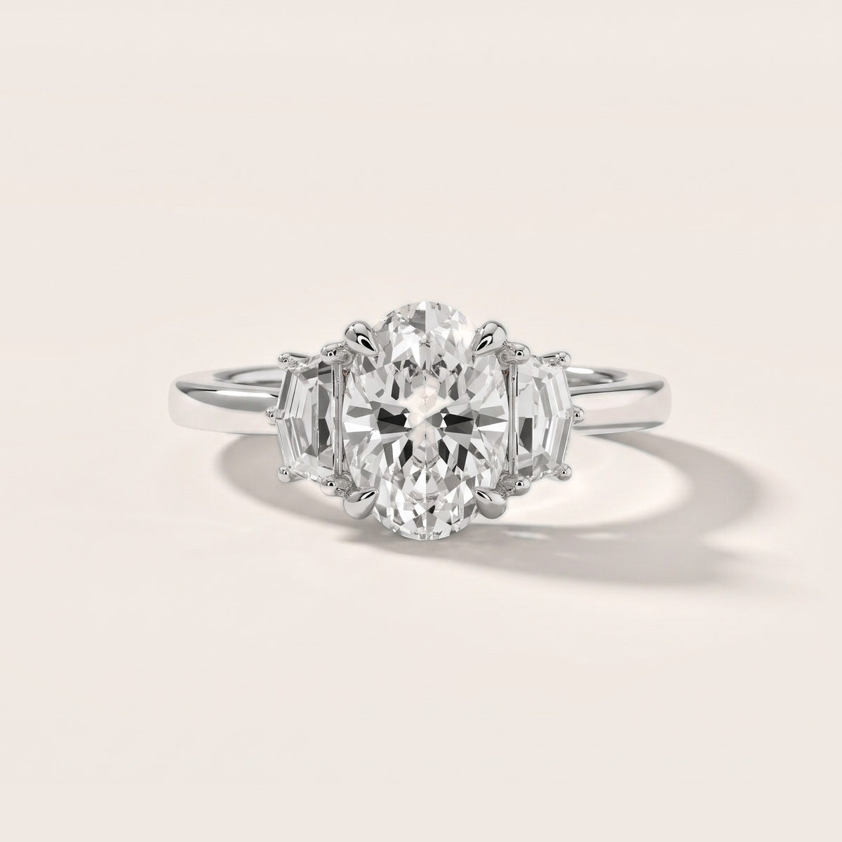 Galena Step-Cut Three-Stone Oval Diamond Engagement Ring in Platinum - front.jpg