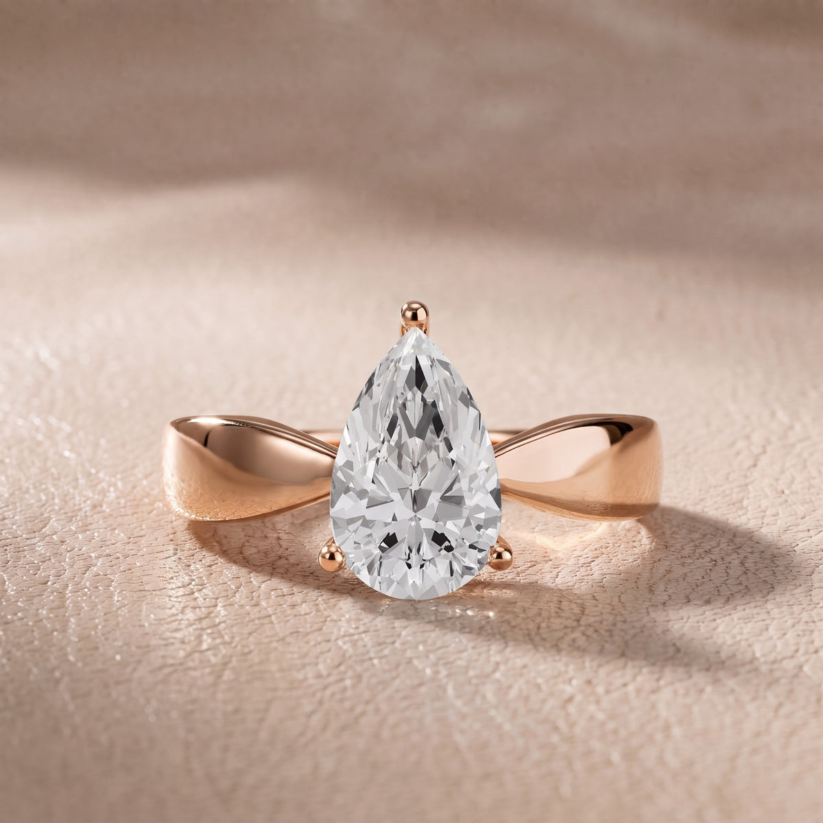 Talia Solitaire Twist Pear Diamond Engagement Ring in Rose Gold - front.jpg