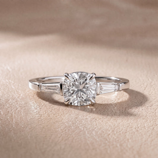 Winnie Three-Stone Cushion Diamond Engagement Ring in Platinum - front.jpg