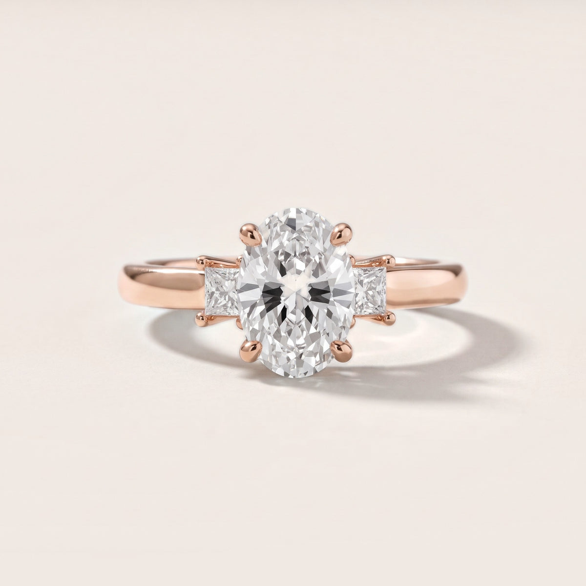 Brenna Three-Stone Oval Diamond Engagement Ring in Rose Gold - front.jpg