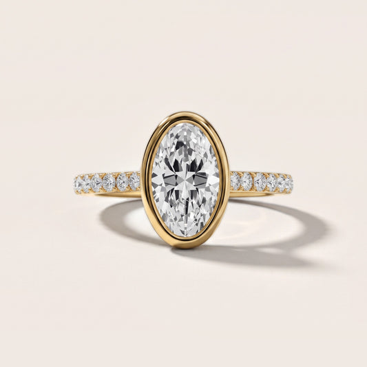 Cora Bezel Pavé Oval Diamond Engagement Ring in Yellow Gold