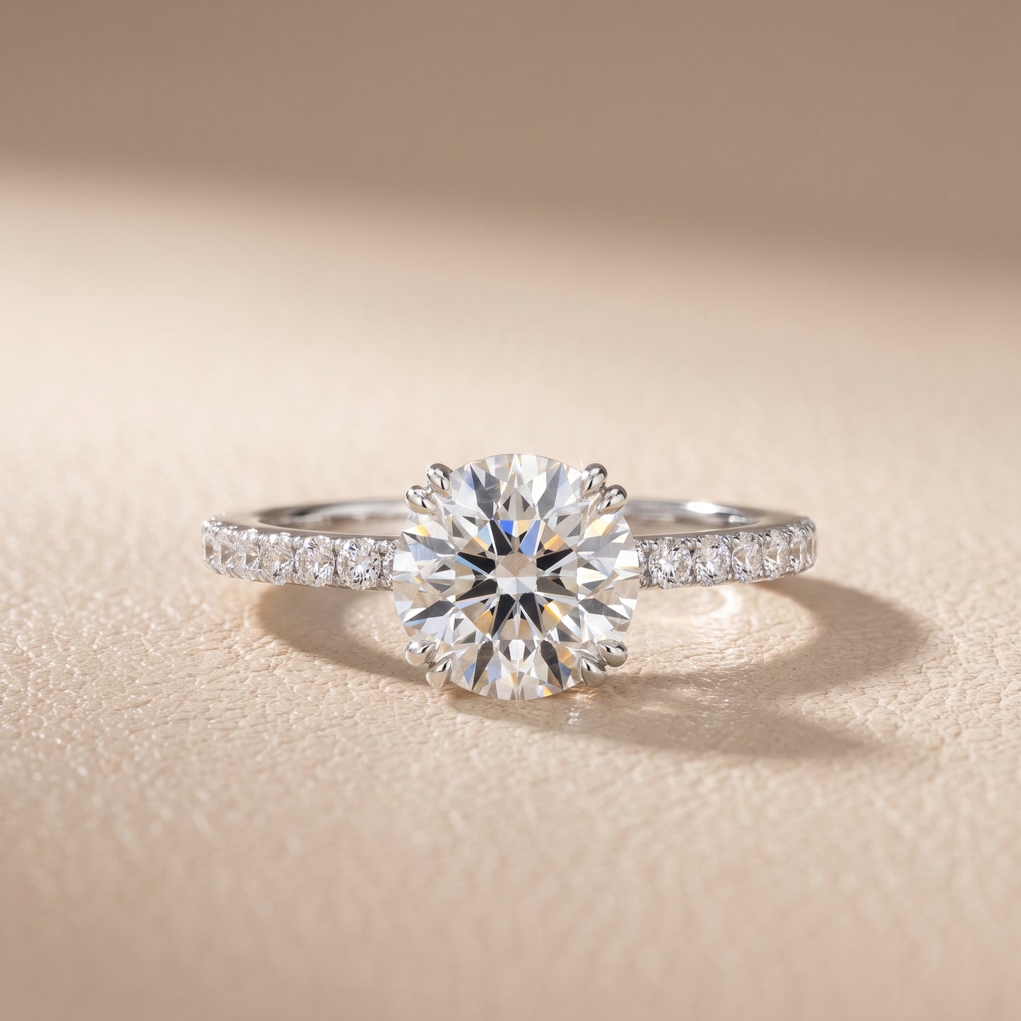 Novara Solitaire Pavé Round Diamond Ring in Platinum - front.jpg